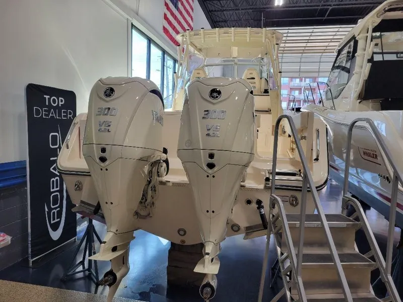 Slide: The Image of 2024 Grady-White Marlin 300 with twin 300 V6 engines on display. - 4