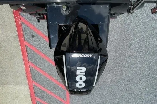 Slide: The Image of Top view of a 2024 Regency 230 DL3 boat with a Mercury 400 outboard motor. - 3