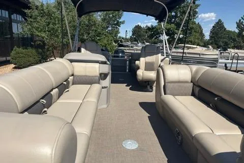 Slide: The Image of 2024 Sun Tracker Party Barge 24 DLX pontoon boat with spacious seating and canopy. - 3