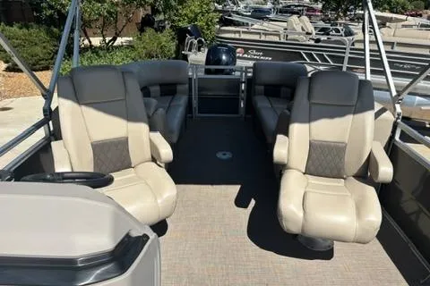 Slide: The Image of 2024 Sun Tracker Party Barge 24 DLX interior with comfortable seating and spacious layout. - 5