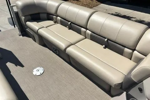 Slide: The Image of 2024 Sun Tracker Party Barge 24 DLX with spacious, comfortable seating in beige upholstery. - 6