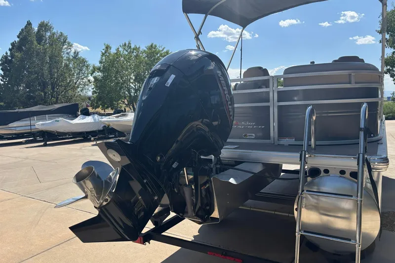 Slide: The Image of 2024 Sun Tracker Party Barge 24 DLX pontoon boat with Mercury outboard motor. - 15
