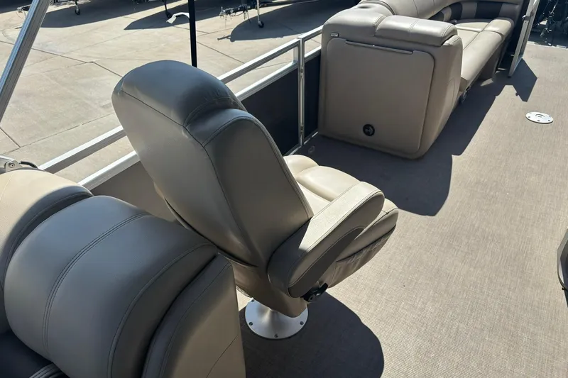 Slide: The Image of 2024 Sun Tracker Party Barge 24 DLX interior with comfortable seating and spacious layout. - 9