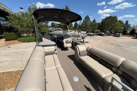 Slide: The Image of 2024 Sun Tracker Party Barge 24 DLX pontoon boat with spacious seating and canopy. - 4
