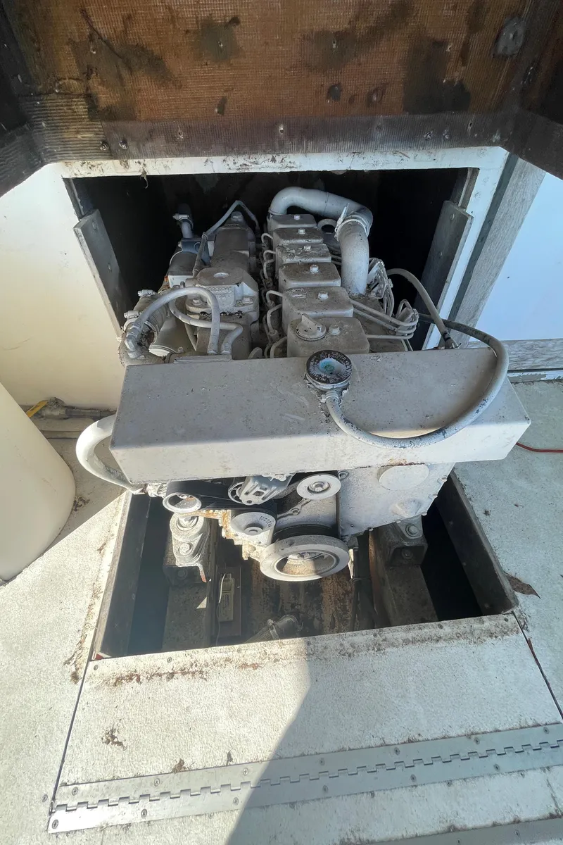 Slide: The Image of 1995 Stuart Angler 33 Downeast boat engine compartment. - 11