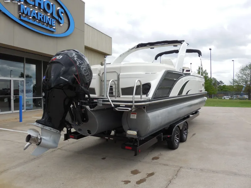 Slide: The Image of 2019 Bennington QX 25 QXFBA pontoon boat on trailer at Nichols Marine. - 3