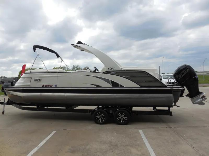 Slide: The Image of 2019 Bennington QX 25 QXFBA pontoon boat on a trailer. - 5