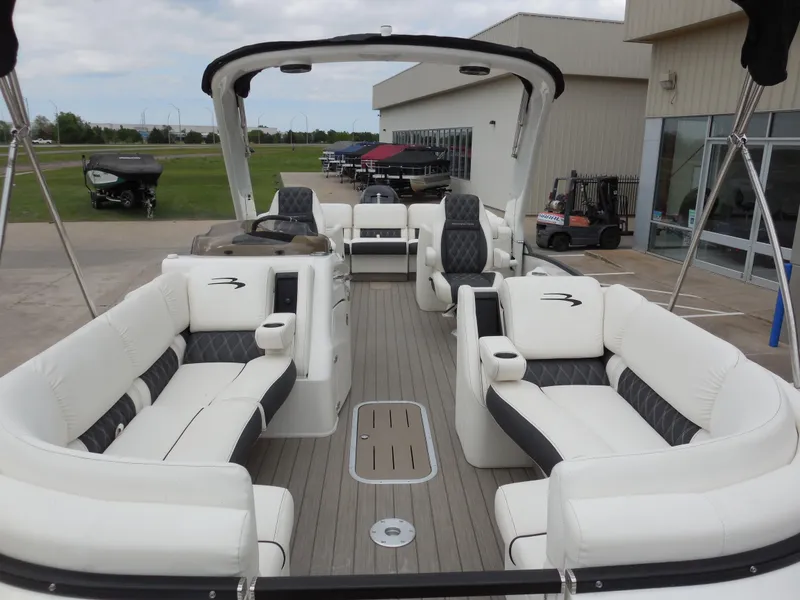Slide: The Image of 2019 Bennington QX 25 QXFBA pontoon boat with luxurious seating and modern design. - 8