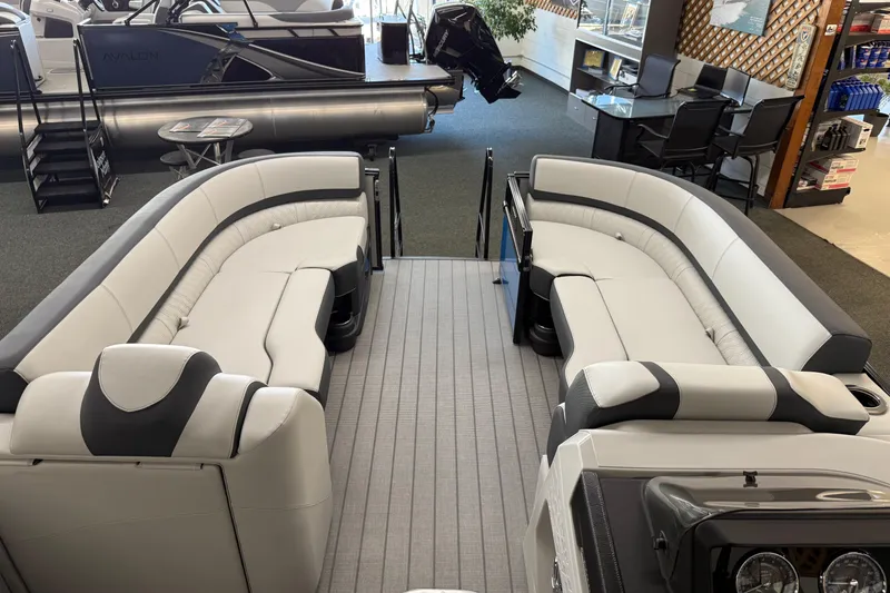 Slide: The Image of 2025 Avalon 2385 Catalina QLS pontoon boat interior with luxurious seating in showroom. - 8