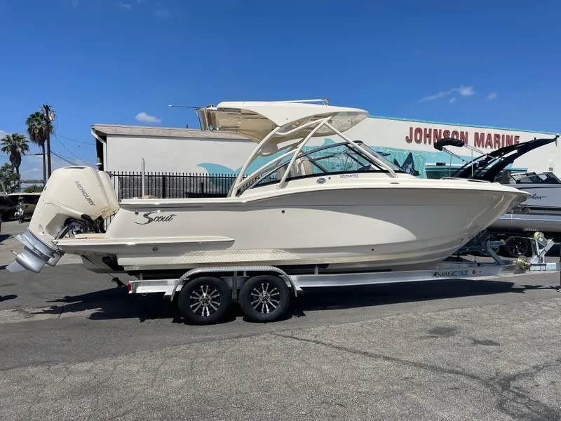 The Image of 2024 Scout 255 Dorado boat on trailer at Johnson Marine dealership. - 0