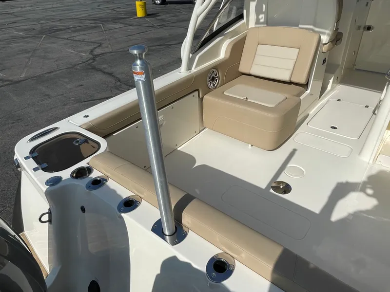Slide: The Image of 2024 Scout 255 Dorado boat interior with seating and rod holders. - 5