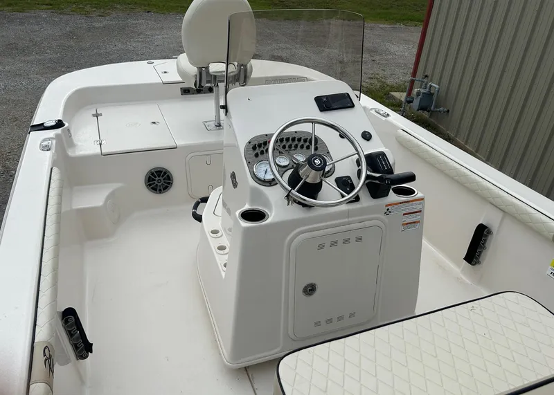 Slide: The Image of 2024 Carolina Skiff 19 LS boat interior with steering console and seating. - 14