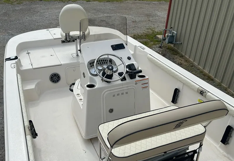 Slide: The Image of 2024 Carolina Skiff 19 LS boat interior with steering console and seating. - 16