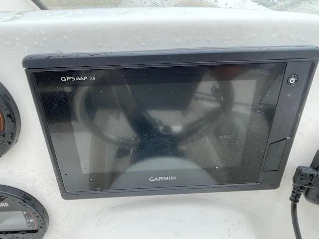 Slide: The Image of Garmin GPSMAP X5 on 2019 Key West 203 DFS boat dashboard. - 11