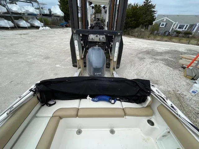Slide: The Image of 2019 Key West 203 DFS boat with Yamaha 150 engine on a forklift. - 15