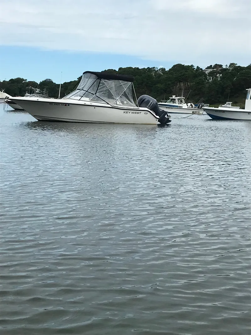 Slide: The Image of 2019 Key West 203 DFS boat anchored on calm water. - 17