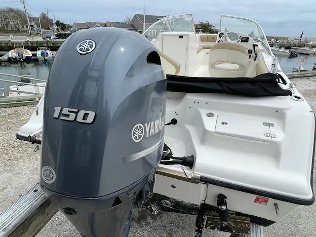 Slide: The Image of 2019 Key West 203 DFS boat with Yamaha 150 outboard motor at marina. - 5