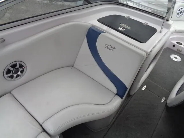 Slide: The Image of 2005 Nautique Air 226 boat interior seating with speaker and storage. - 12