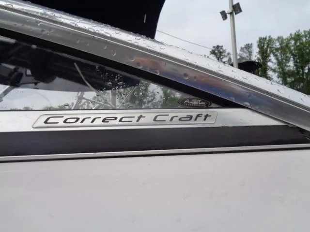 Slide: The Image of Close-up of 2005 Nautique Air 226 boat with Correct Craft logo. - 20