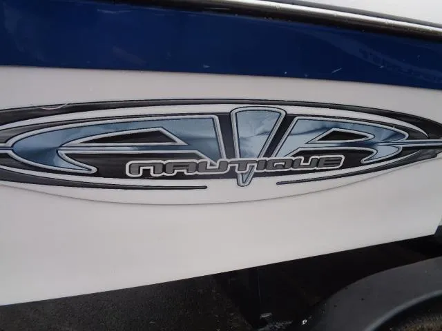 Slide: The Image of 2005 Nautique Air 226 boat logo on the side hull. - 3
