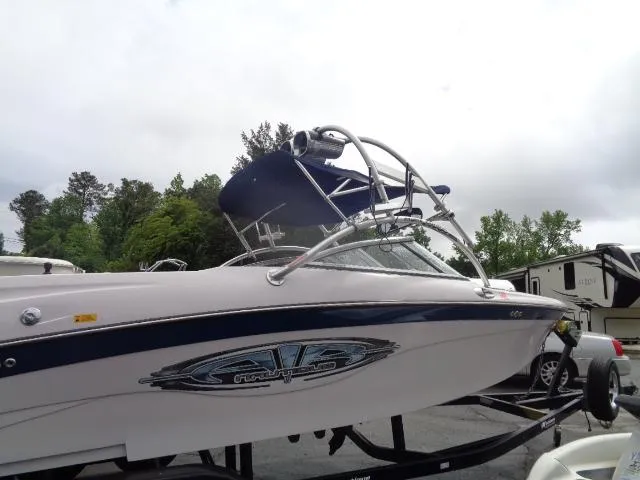 Slide: The Image of 2005 Nautique Air 226 boat on trailer, side view. - 6