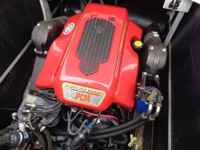Slide: The Image of 2005 Nautique Air 226 PCM Excalibur engine in boat compartment. - 9