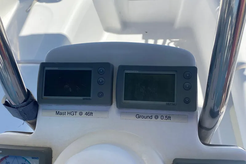 Slide: The Image of Hunter 31-2 2009 boat dashboard with navigation instruments and height indicators. - 17