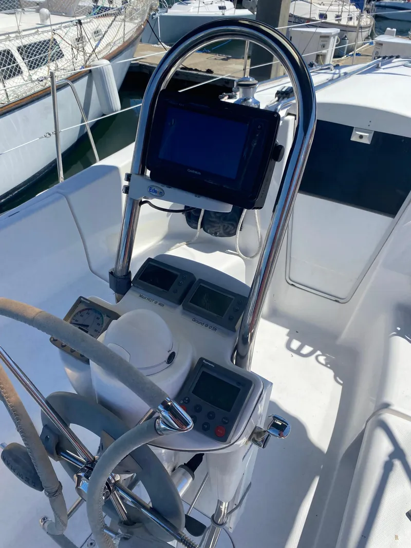 Slide: The Image of Hunter 31-2 2009 sailboat cockpit with navigation instruments and steering wheel. - 2