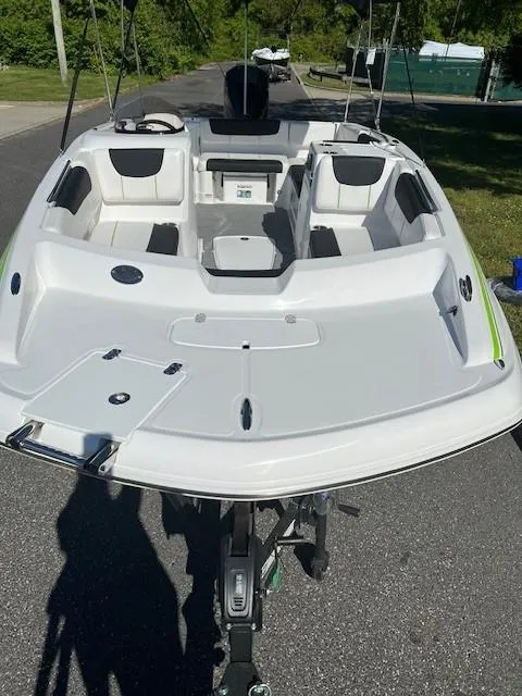 Slide: The Image of 2024 Tahoe 2150 boat with spacious seating and modern design. - 10