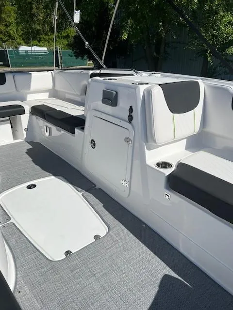 Slide: The Image of 2024 Tahoe 2150 boat interior with seating and storage compartments. - 7