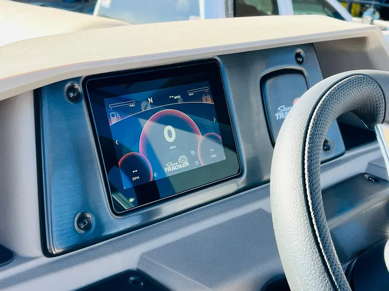 Slide: The Image of 2024 Sun Tracker Fishin' Barge 20 DLX dashboard with digital display. - 29