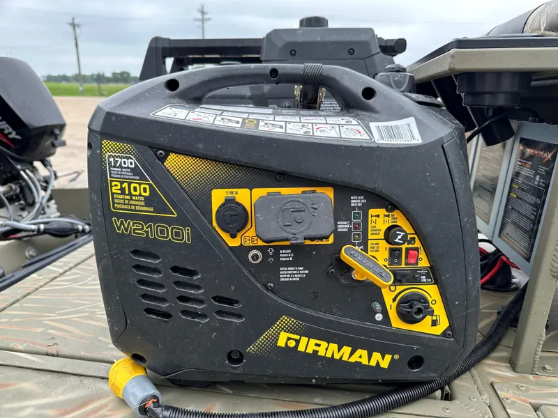 Slide: The Image of Portable Firman generator on a 2024 Tracker Grizzly 2072 CC Sportsman Kicker boat. - 5