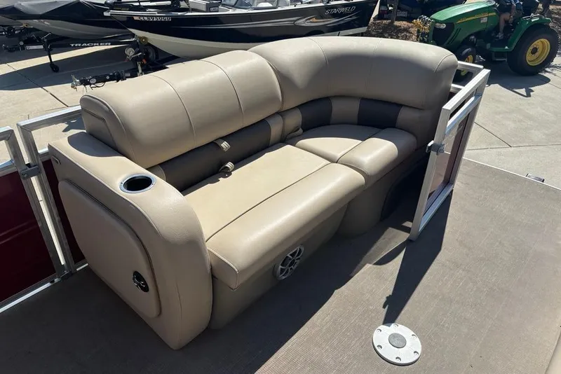 Slide: The Image of 2024 Sun Tracker Party Barge 22 RF XP3 with beige seating and cup holder. - 10