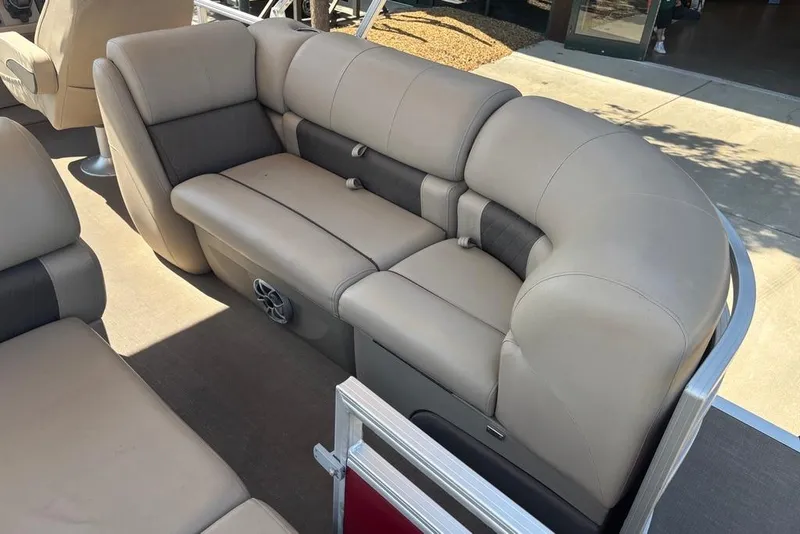 Slide: The Image of 2024 Sun Tracker Party Barge 22 RF XP3 interior seating with beige upholstery. - 11