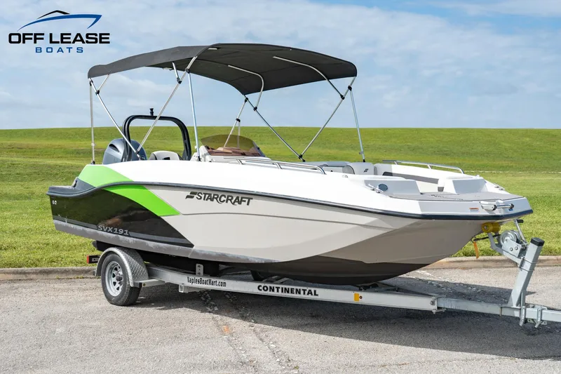 Slide: The Image of 2022 Starcraft SVX 191 OB boat on Continental trailer with bimini top. - 0