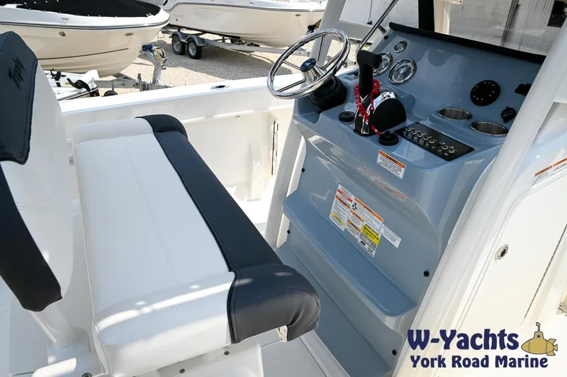 Slide: The Image of 2024 Bayliner Trophy T22CC boat console and seating at W-Yachts York Road Marine. - 16