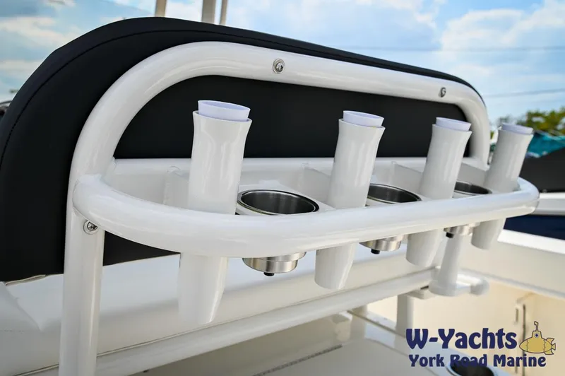 Slide: The Image of 2024 Bayliner Trophy T22CC boat rod holders and cup holders. - 21