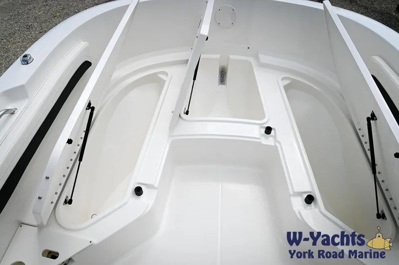 Slide: The Image of 2024 Bayliner Trophy T22CC boat interior storage compartments at W-Yachts York Road Marine. - 6