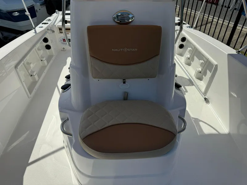 Slide: The Image of 2024 NauticStar 191 Hybrid boat interior with cushioned seating. - 11