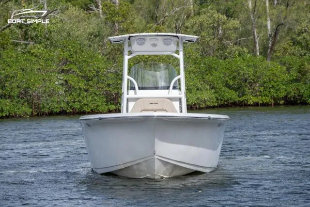 Slide: The Image of 2023 Sea Pro 219 Deep V CC boat on water, front view. - 1