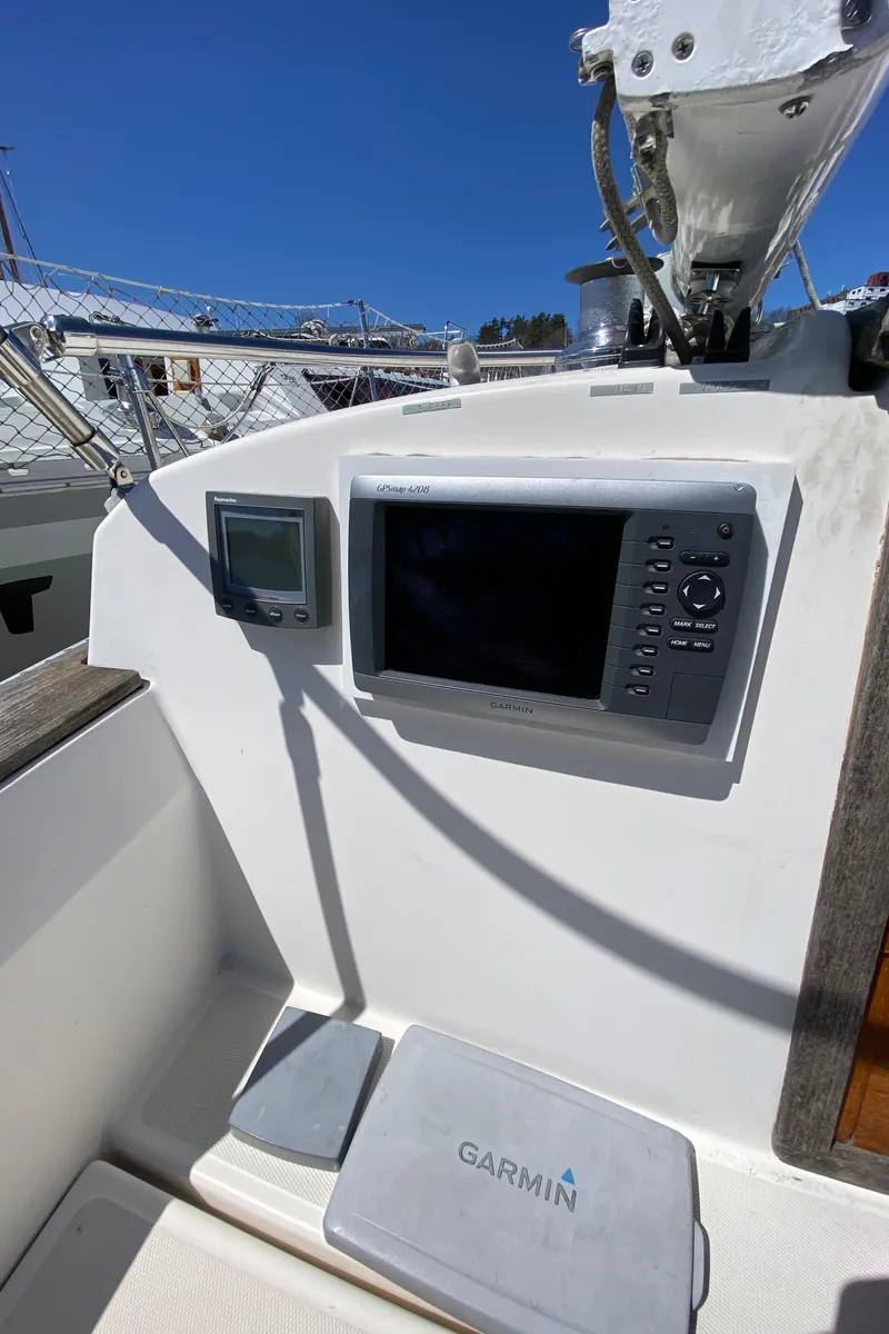 Slide: The Image of Cockpit of 1985 Sabre 32 sailboat with Garmin navigation equipment. - 13