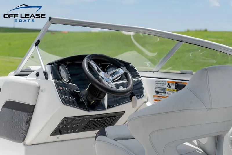 Slide: The Image of 2020 Hurricane 217 SD boat dashboard and steering wheel, Off Lease Boats. - 10