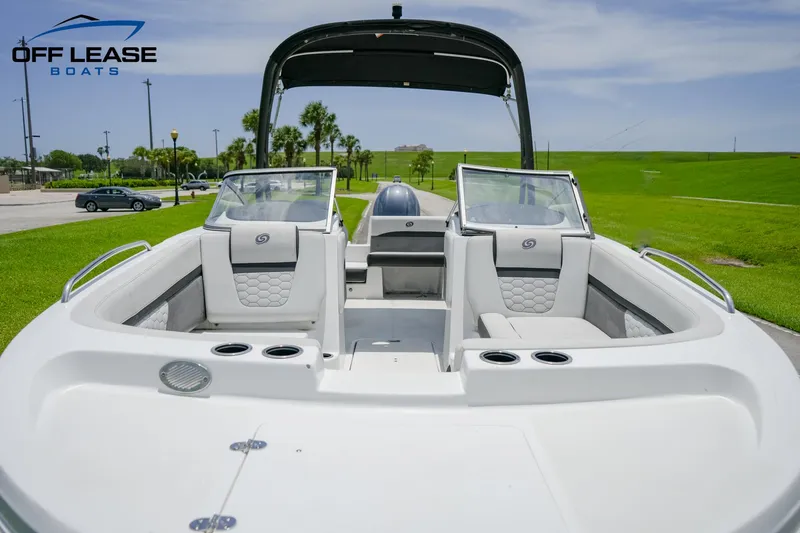Slide: The Image of 2020 Hurricane 217 SD boat interior with dual consoles and seating. - 4
