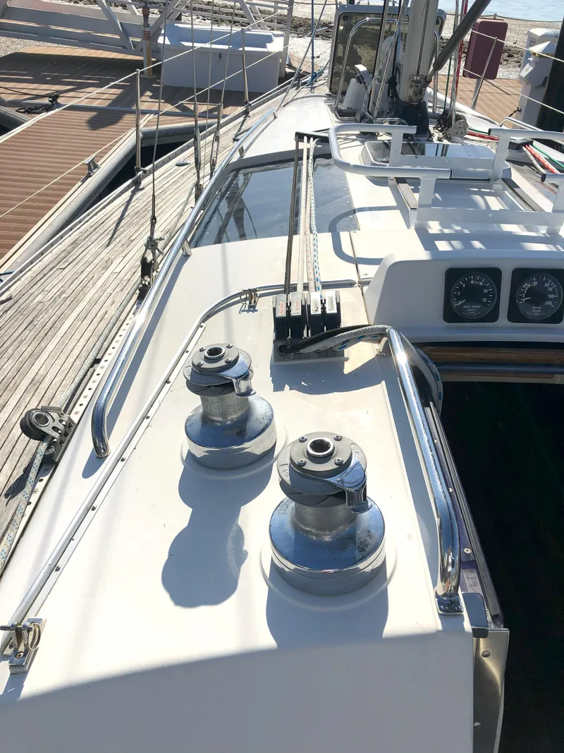 Slide: The Image of 1988 Nautor Swan 36-2 sailboat deck with winches and rigging. - 5