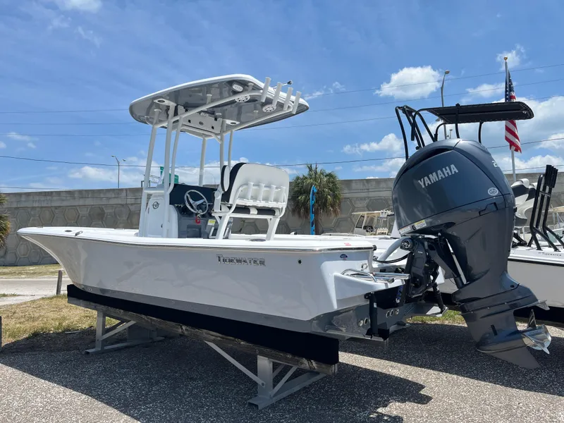 Slide: The Image of 2024 Tidewater 2210 Carolina Bay boat with Yamaha engine on display. - 2