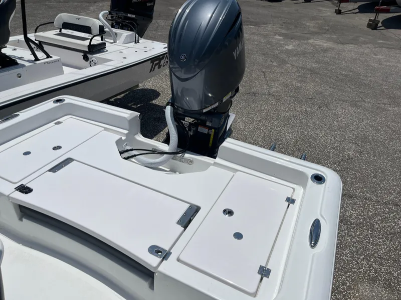 Slide: The Image of 2024 Tidewater 2210 Carolina Bay boat with Yamaha outboard motor. - 5