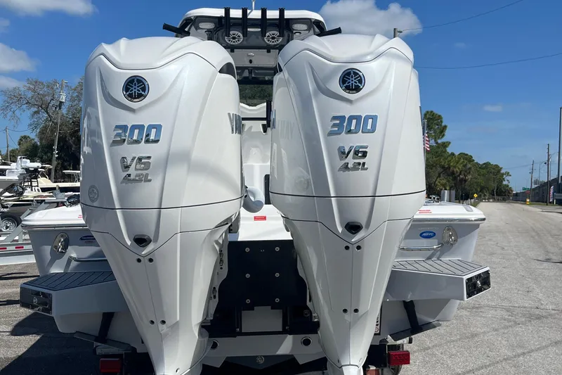 Slide: The Image of 2025 Tidewater 2700 Carolina Bay with twin 300 V6 outboard engines. - 10