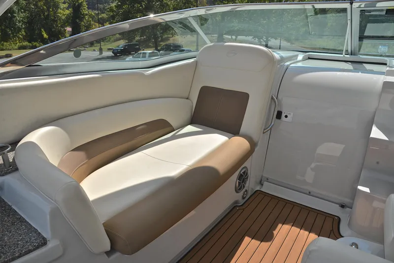Slide: The Image of Crownline 350 SY 2020 boat interior with beige and brown seating. - 32