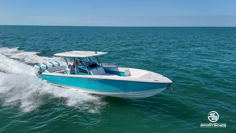 The Image of 2020 Nor-Tech 390 Sport boat cruising on open water. - 0