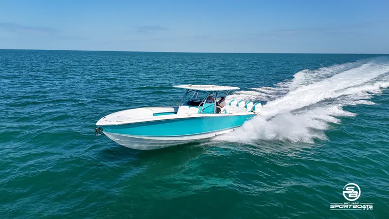 Slide: The Image of 2020 Nor-Tech 390 Sport boat cruising on open water. - 36